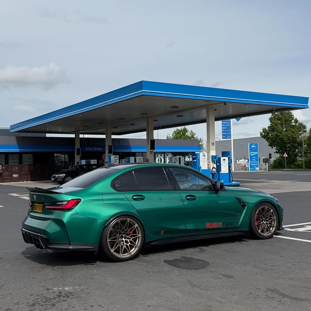 Green BMW M3 stopped during a Nürburgring road trip